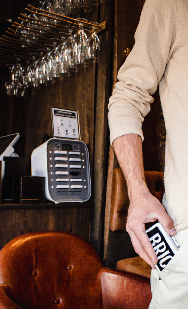 Guy borrowing a Brick at a bar in Sweden